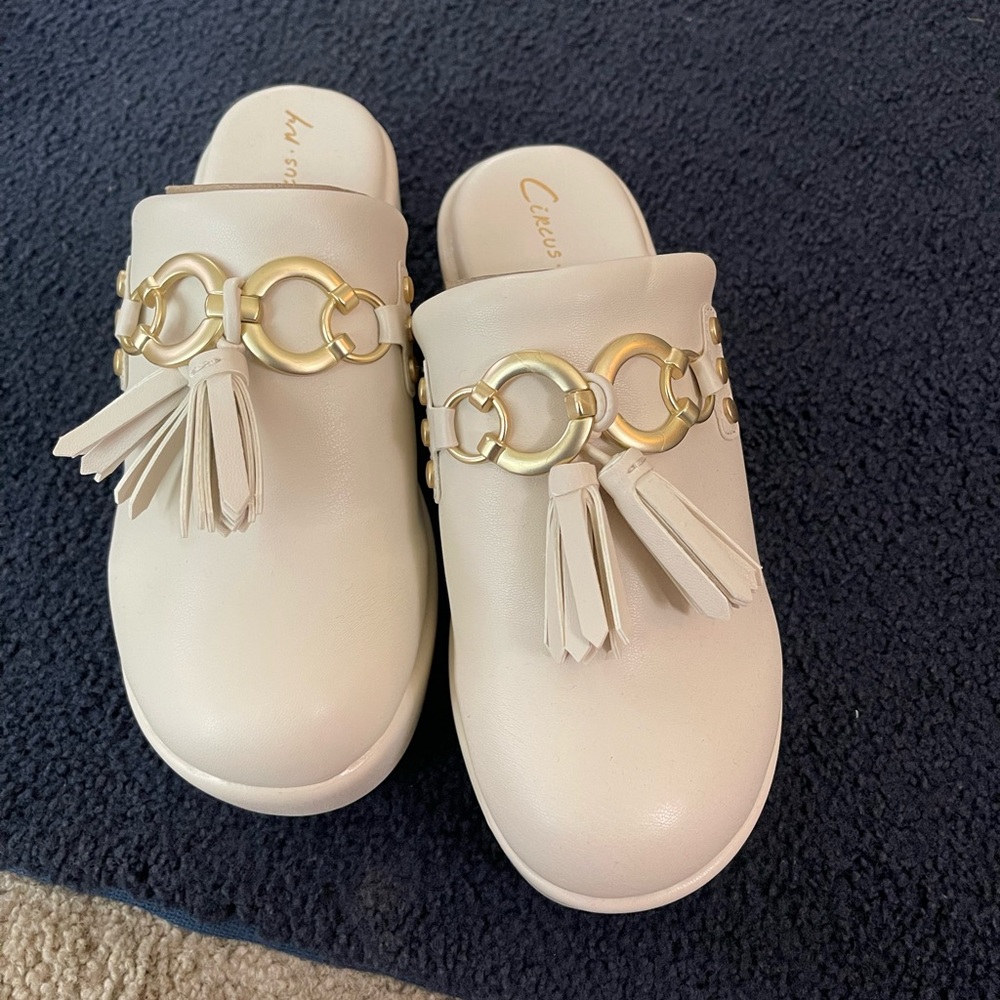 Circus NY shoes with gold details and tassels